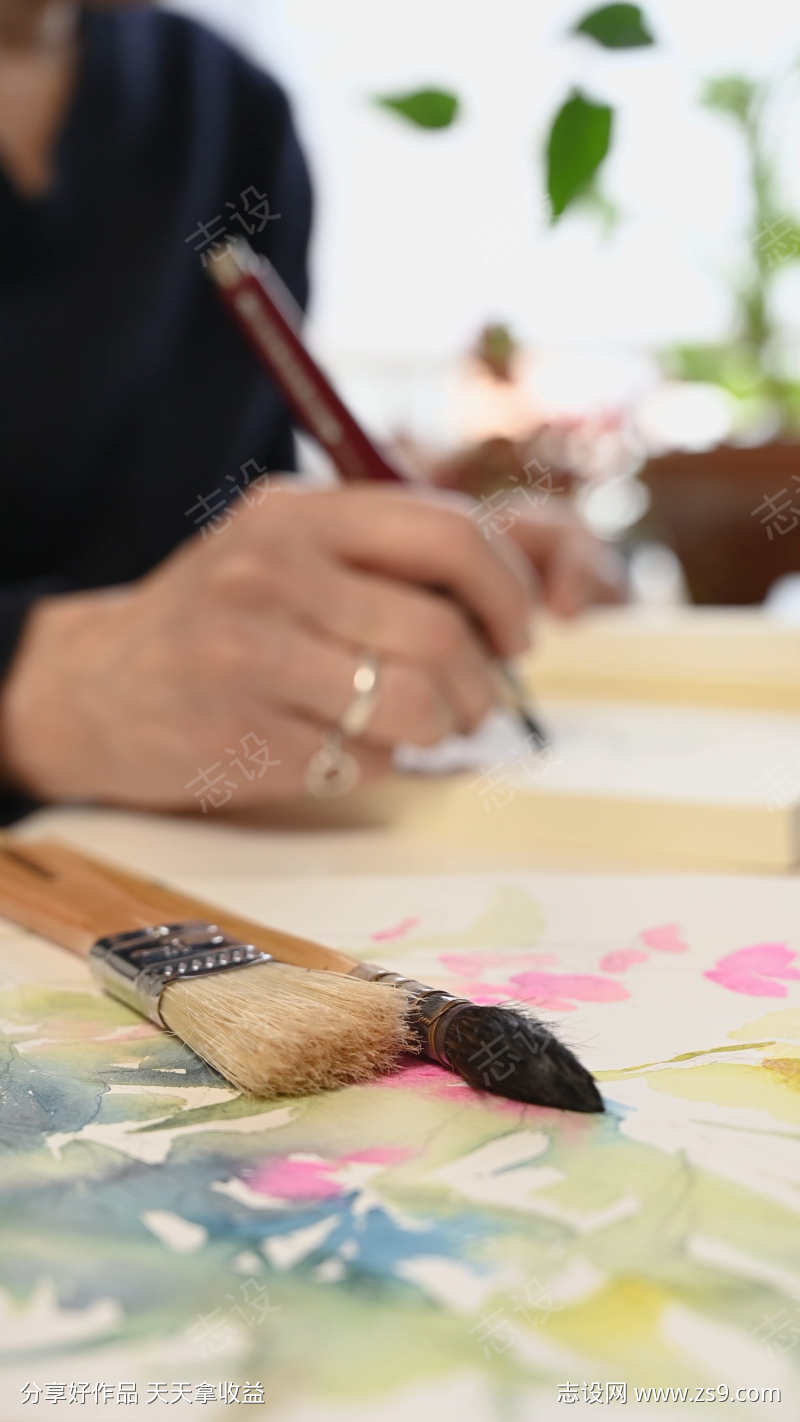 特写画笔背景人作画